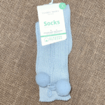 Calcetines pompones celeste